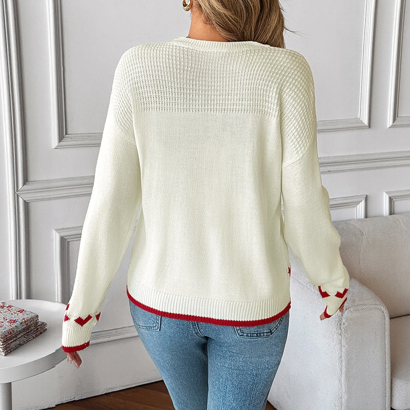 Women's knitted fine knit pullover with heart intarsias, round neckline and ribbed cuffs Chichicherry