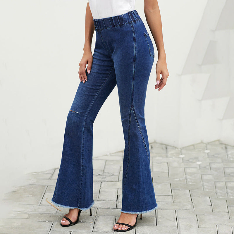 Women's high-waisted flared denim pants with elastic drawstring waistband, decorative seams, and raw hem Chichicherry