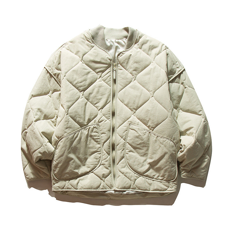 Unisex Lightweight Boxy Puffer Jacket with distinctive diamond quilting, front round pockets, and ribbed collar Chichicherry