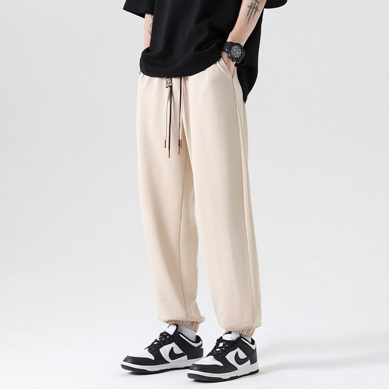 Men's Wide Jogging Pants in a Loose Fit with Adjustable Drawstring, Elastic Ankle Cuffs, and Soft Touch Chichicherry