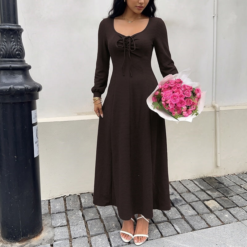Women's midi dress made of ribbed fine knit with lace-up neckline, fitted A-line and long sleeves