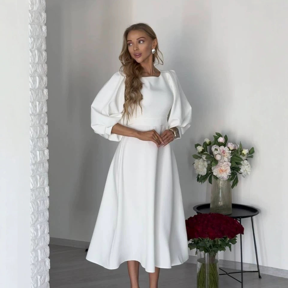 Damen Midikleid mit offenem Rückenausschnitt, voluminösen Puffärmeln und Bindegürtel Chichicherry