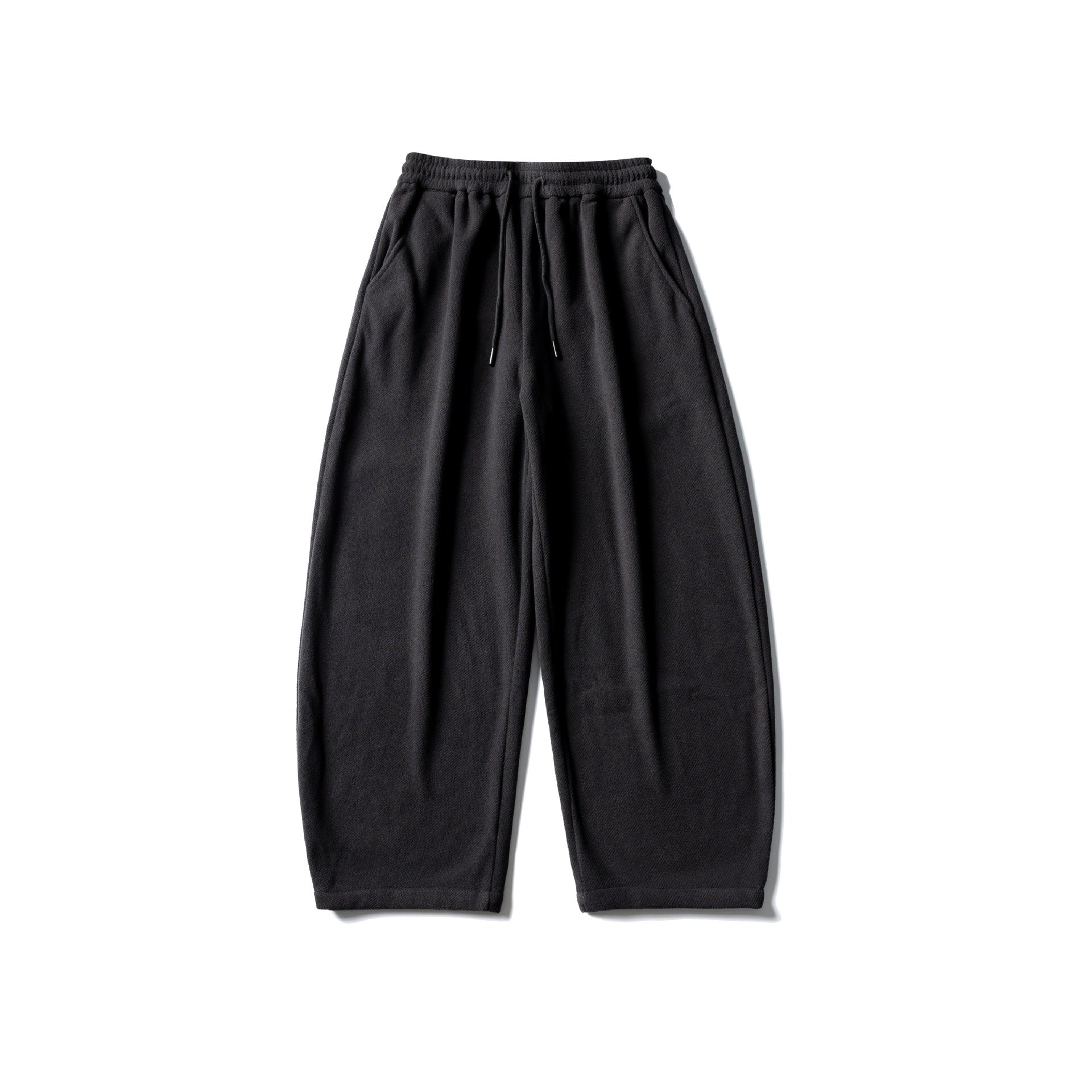 Unisex fleece jogging pants with elastic drawstring waistband, side pockets and tapered leg Chichicherry