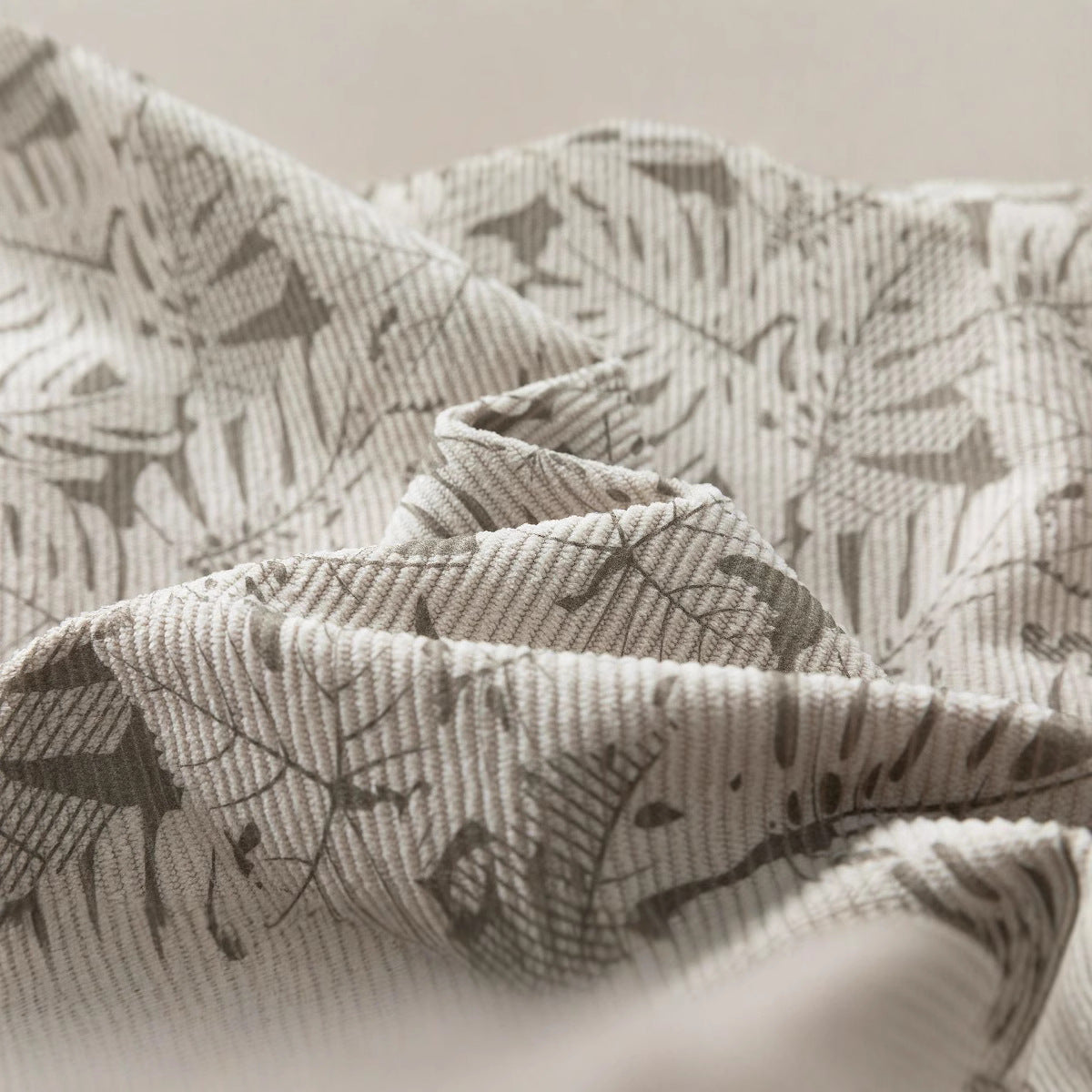 Men's cord jacket in trucker style with tonal leaf pattern, snap-button front and flap pockets Chichicherry