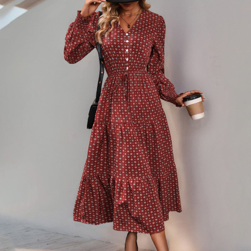 Women's midi dress in boho style with V-neck, button placket, cord tie waist, and tiered ruffle skirt Chichicherry