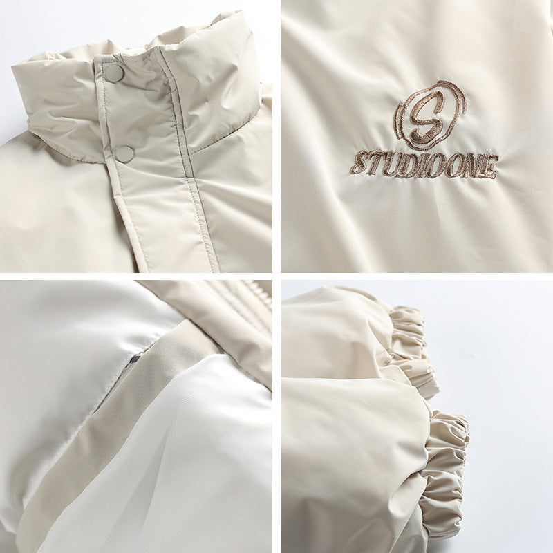 Unisex Boxy padded short jacket with stand-up collar and concealed button placket Chichicherry