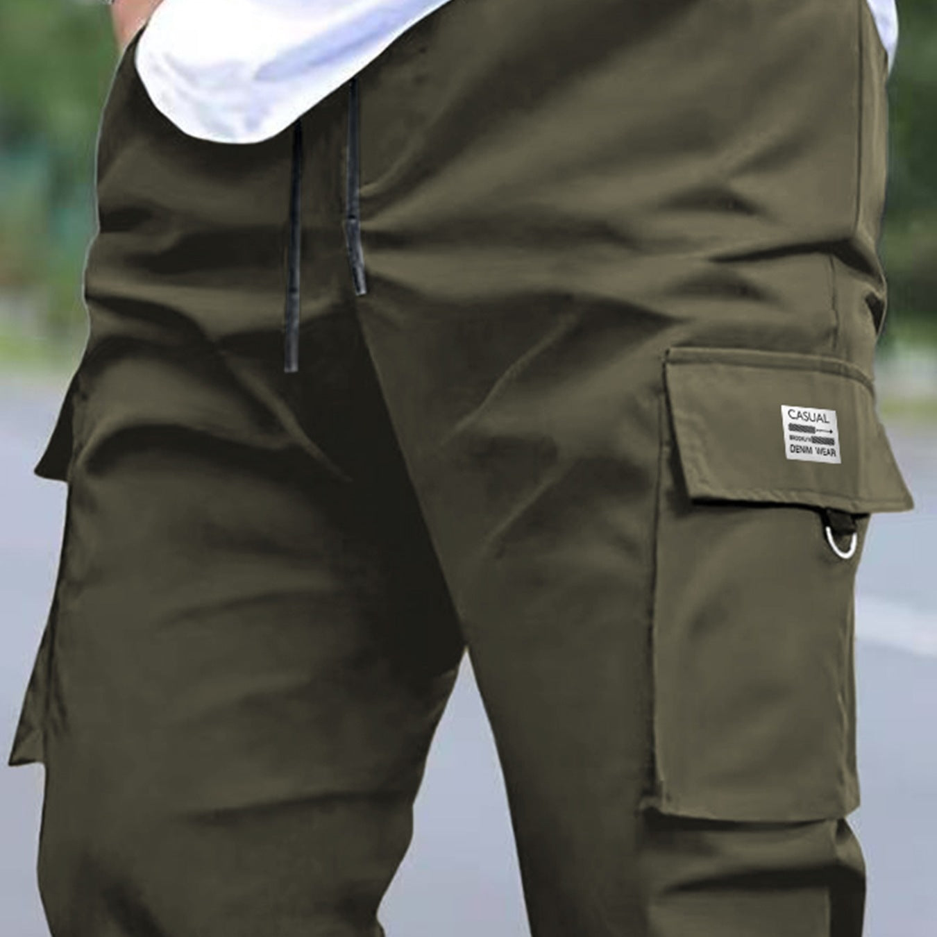 Men's utility cargo pants in a tapered cut with elastic drawstring waistband, large flap and zip pockets Chichicherry