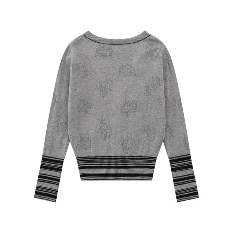 Ladies cardigan with V-neck, fine jacquard pattern and contrasting cuffs Chichicherry
