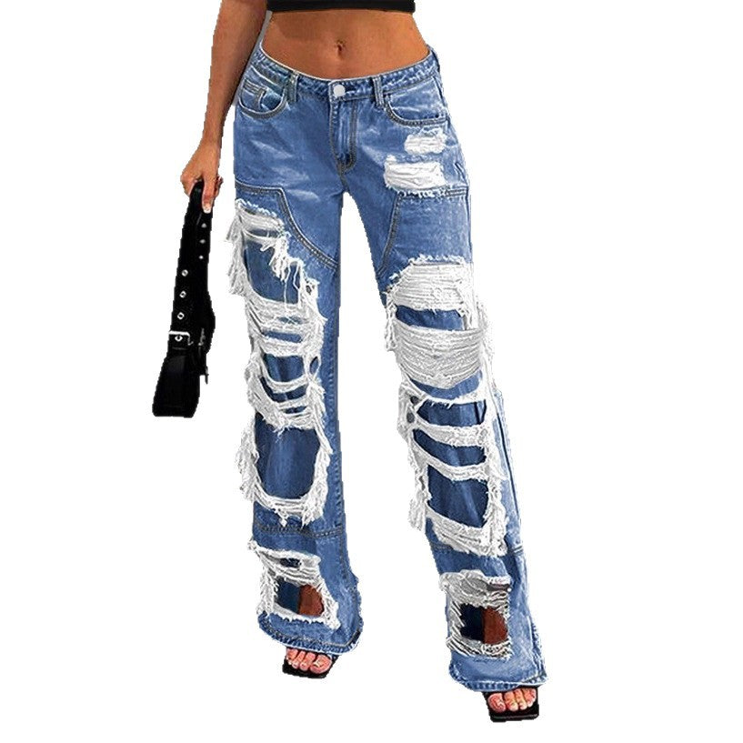 Women heavily distressed flared jeans with wide legs and ripped inserts Chichicherry