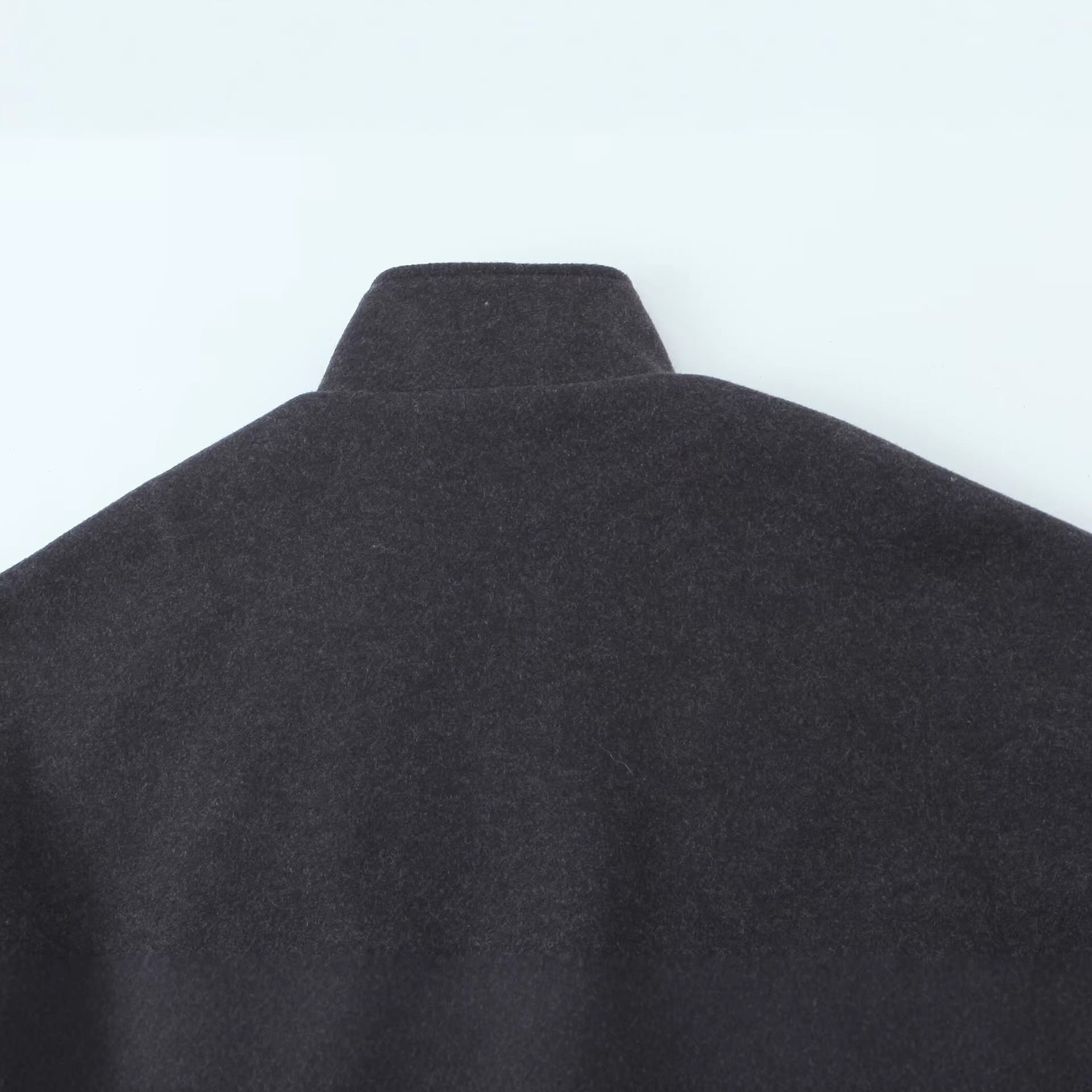 Women's short-cut wool blouson jacket with stand-up collar, snap button placket, and elastic hem Chichicherry