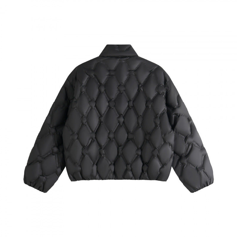 Unisex short cut quilted jacket in boxy cut with diamond quilting and diagonal zip pockets Chichicherry