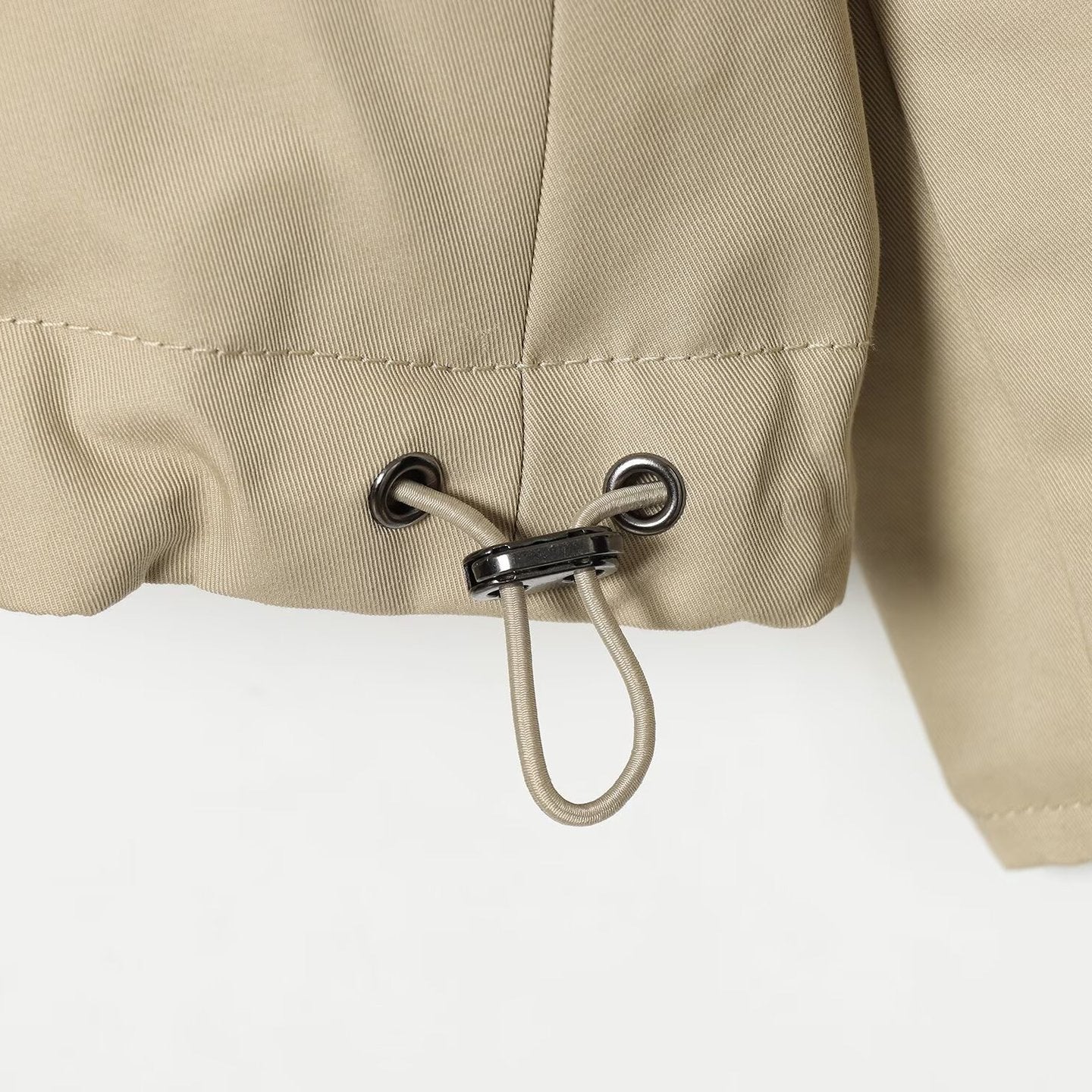 Women's reversible lightweight transitional jacket with stand-up collar, raglan sleeves, and drawstring hem Chichicherry
