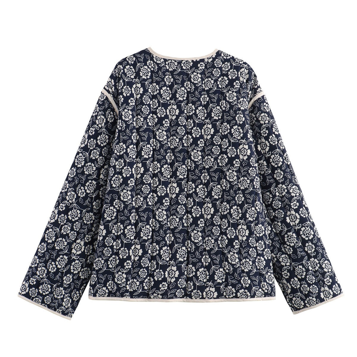 Ladies quilted jacket with floral allover, V-neck, contrast piping and patch pockets Chichicherry