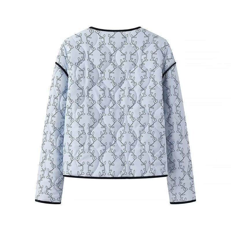 Women's quilted short jacket with V-neck, contrast piping, and floral quilted application Chichicherry