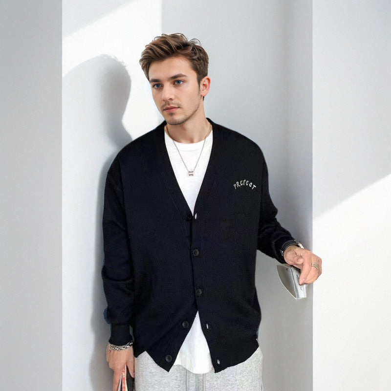 Herren Oversized-Strickpullover mit großflächigem Jacquard-Gesichtsmotiv und geripptem Saum Chichicherry