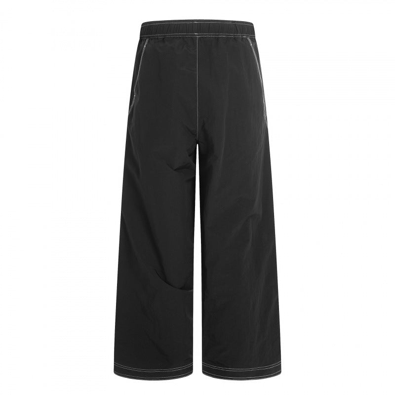 Women's wide pants with elastic waistband, drawstring and contrasting decorative seams Chichicherry