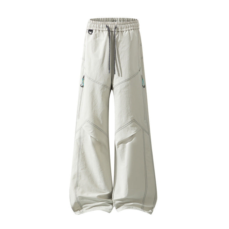 Men's Wide Cargo Pants with Drawstring Waistband, Utility Seams and Zip Pockets Chichicherry