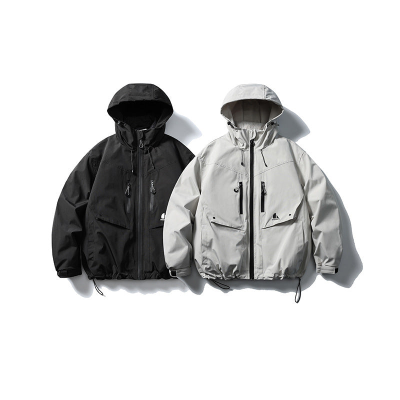 Unisex Waterproof technical hooded jacket with multiple pockets and adjustable hem Chichicherry