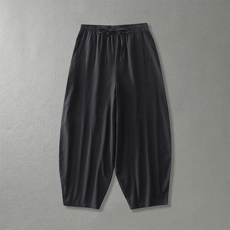 Women's wide harem pants made of lightweight satin with drawstring and side pockets Chichicherry