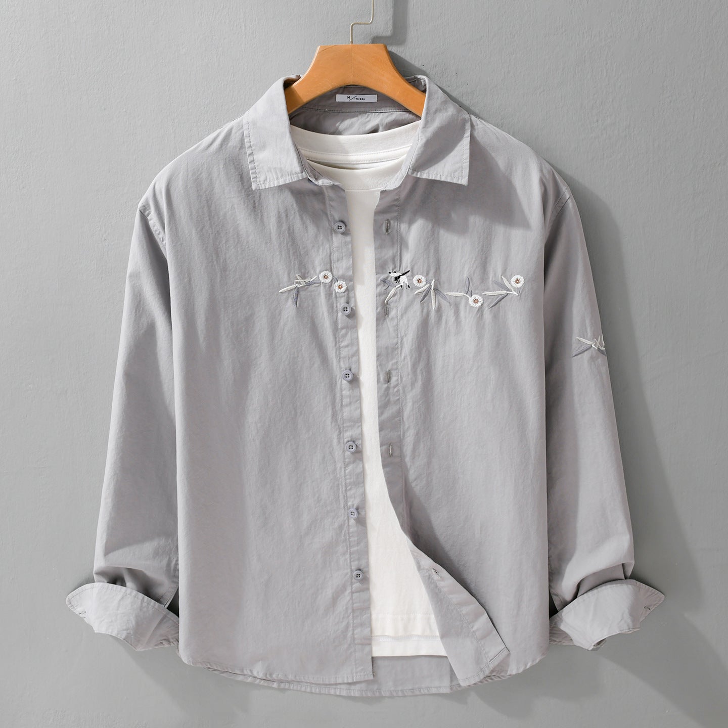 Women's loose embroidered cotton overshirt with kent collar and layering detail Chichicherry
