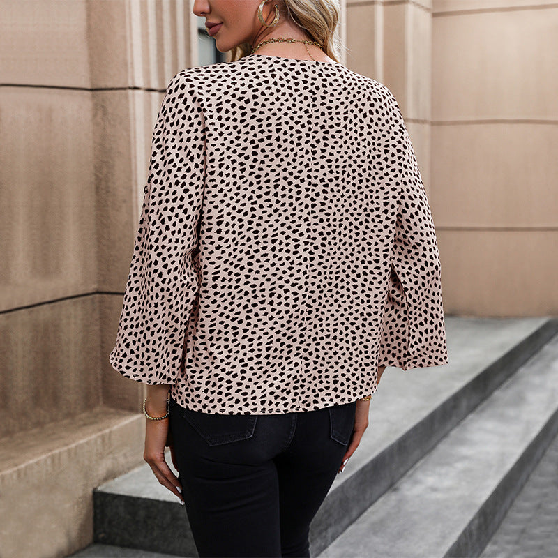 Ladies loosely falling viscose blouse with V-neck, dropped shoulder, and roll-up sleeves Chichicherry