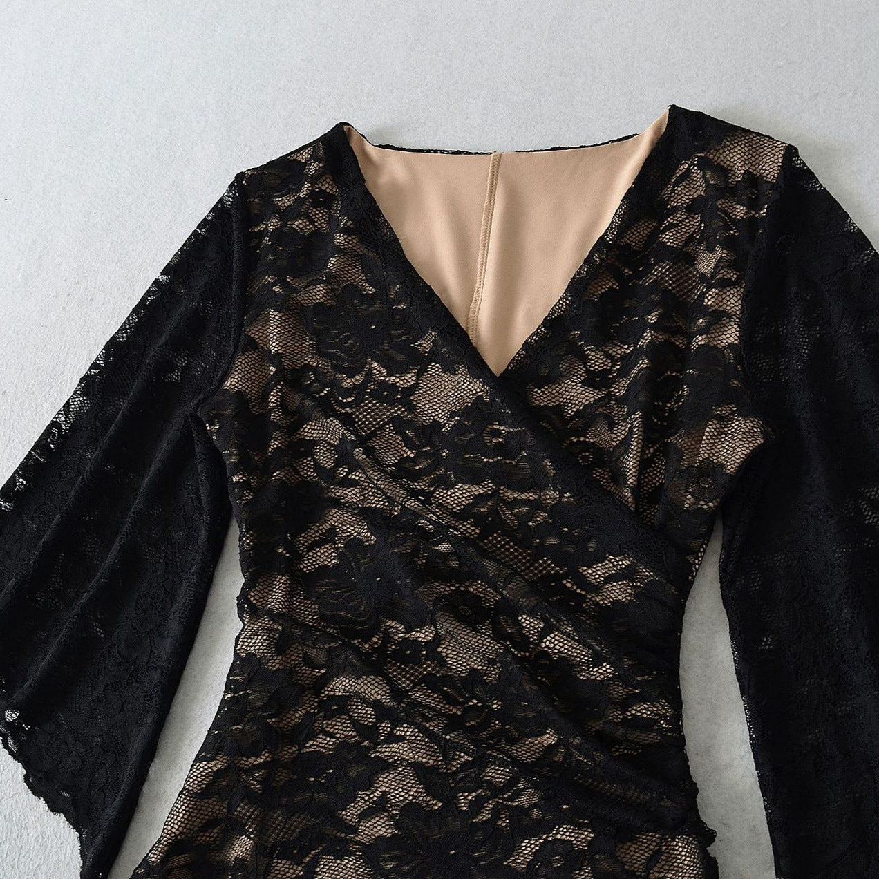 Women's lace wrap dress with trumpet sleeves and gathered silhouette Chichicherry