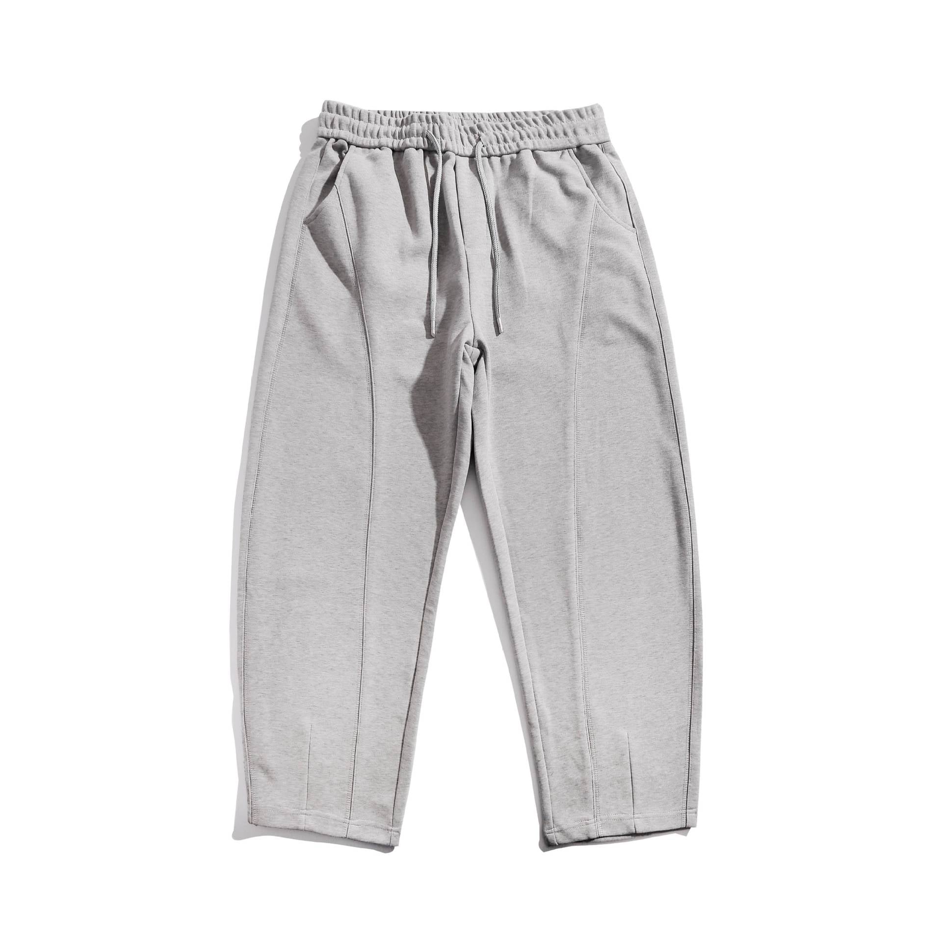 Women's cropped jogger pants with decorative seams, high elastic waistband and side pockets