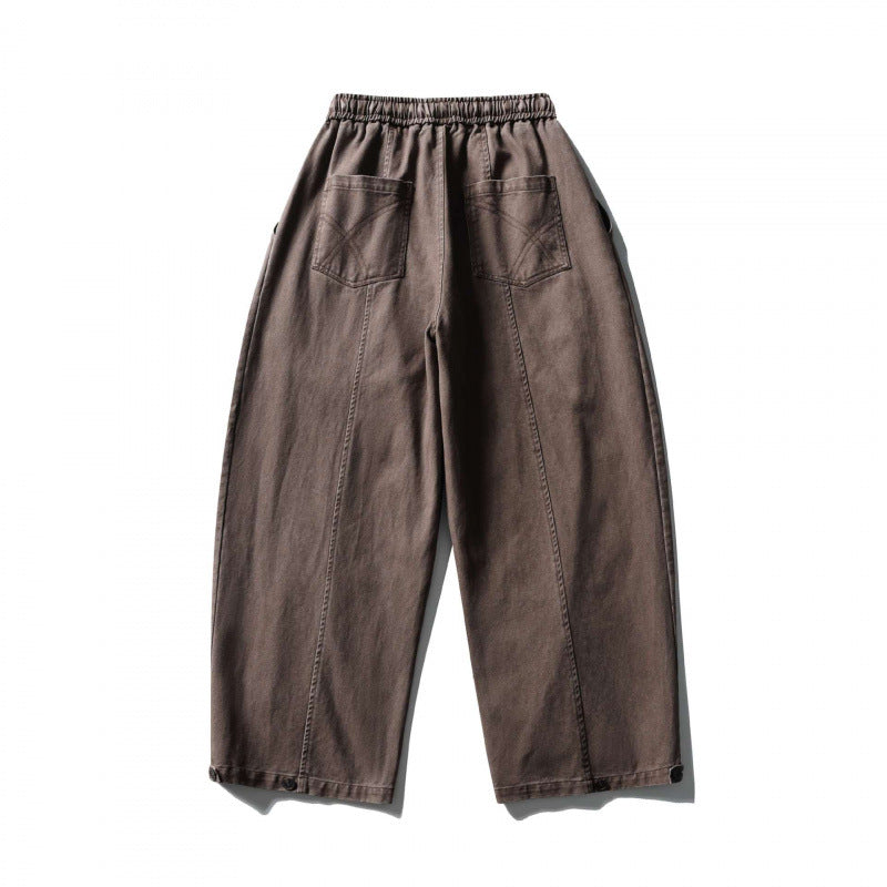 Unisex wide balloon pants made of cotton blend with drawstring waistband and decorative darts Chichicherry