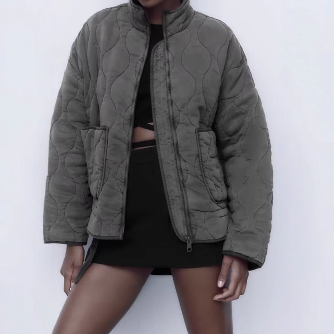 Unisex quilted jacket with stand-up collar, front pockets, and drawstring Chichicherry