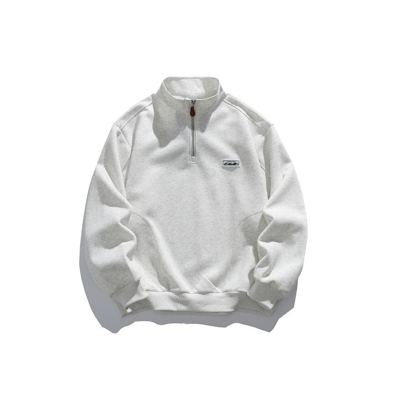 Unisex half-zip sweatshirt with stand-up collar, raglan sleeves, and minimalist chest patch Chichicherry