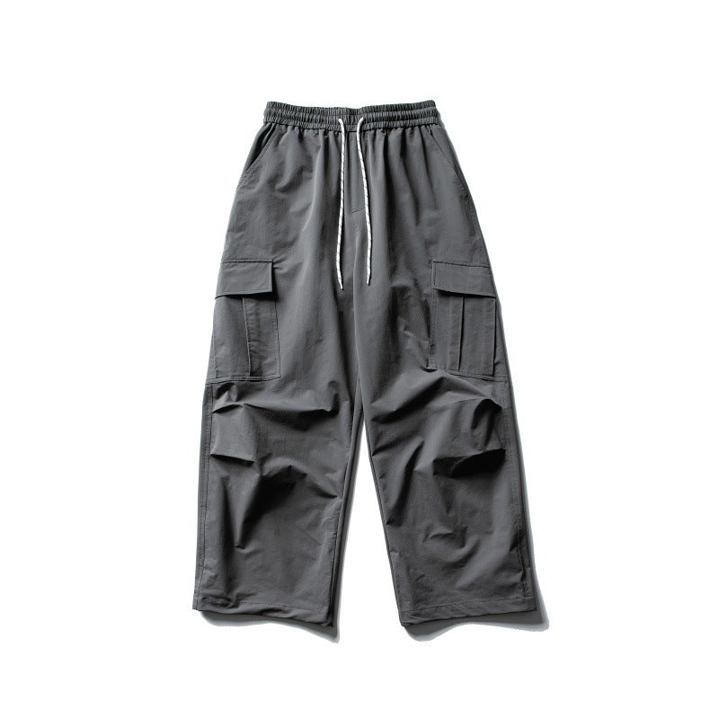 Unisex Wide Cargo Utility Pants in Baggy Cut with Elastic Drawstring Waist and Generous Flap Pockets