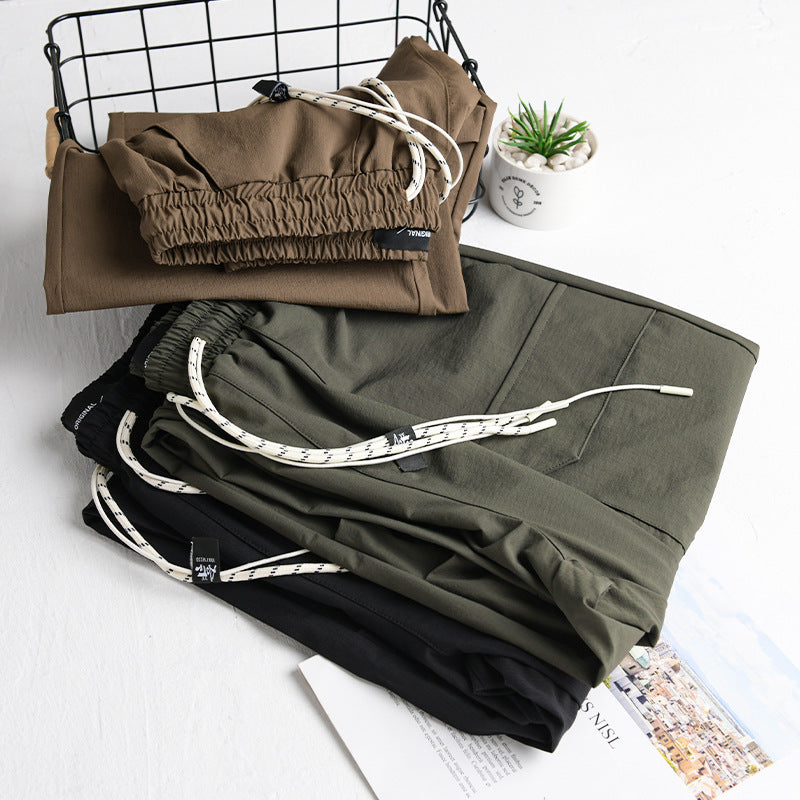 Men's Oversized Cargo Pants made of lightweight functional fabric with drawstring waistband and multiple pockets Chichicherry