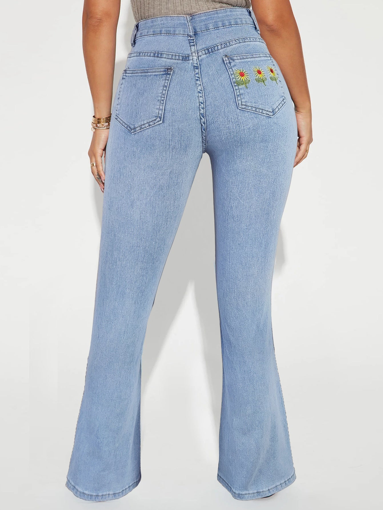 Women's high-waisted flared jeans with daisy embroidery and shaping cut Chichicherry