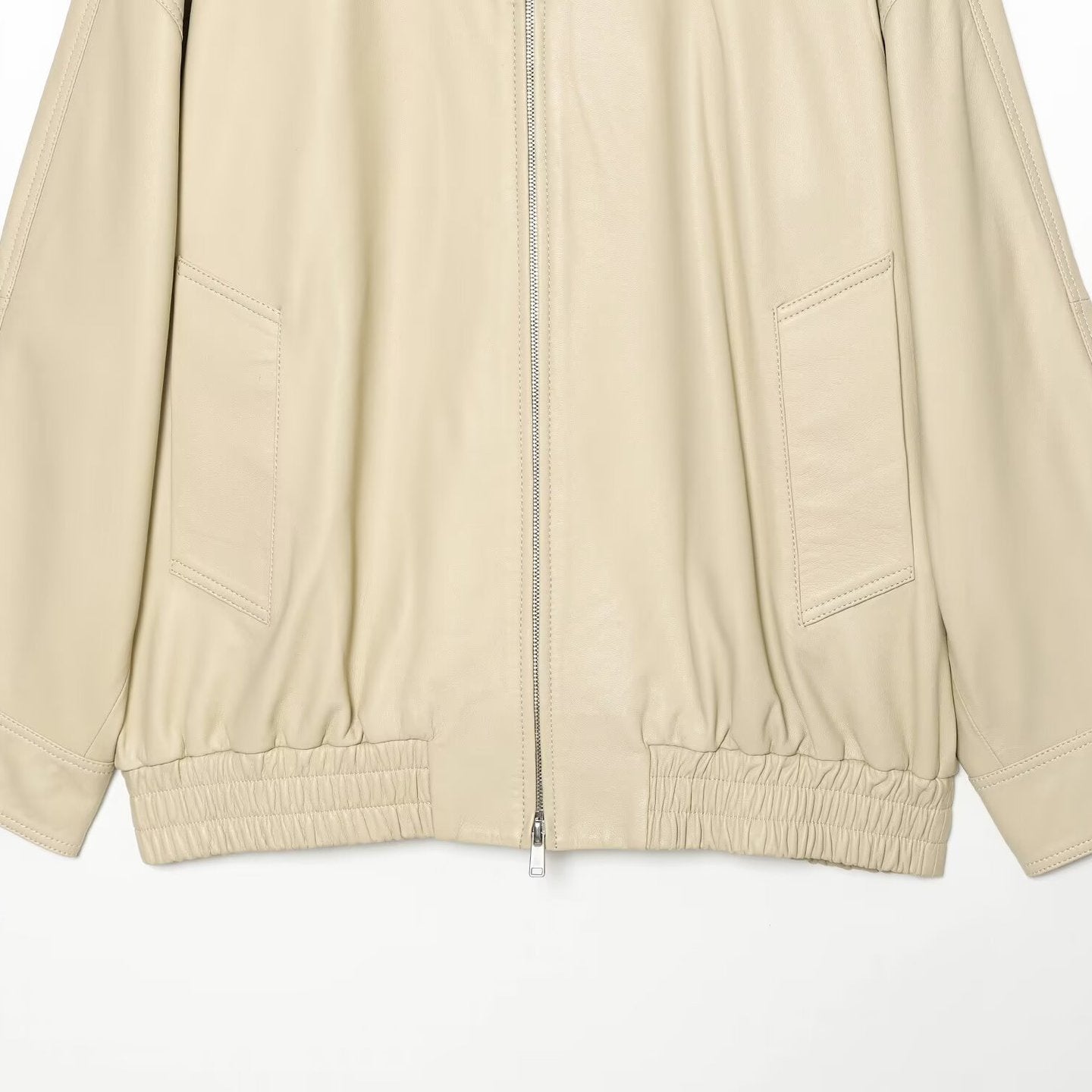 Women's loosely cut leather-look transitional jacket with stand-up collar, two-way zipper, and kangaroo pockets Chichicherry