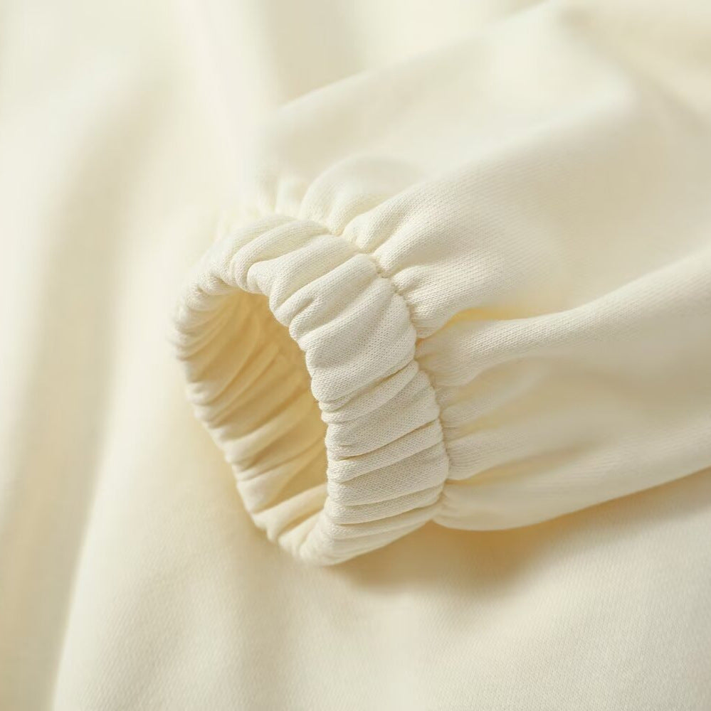 Women’s oversized pullover with half zip stand collar, elastic hem, and drop shoulders Chichicherry