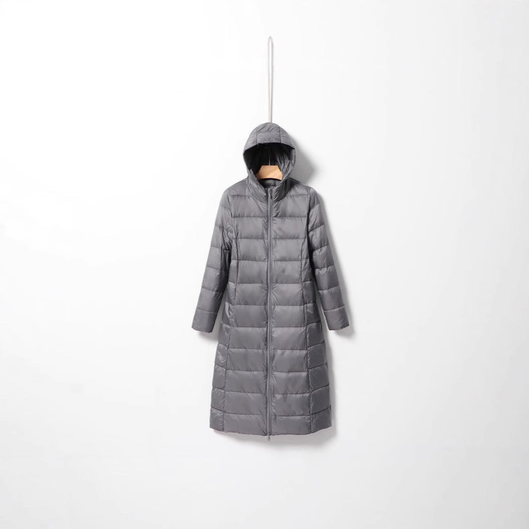 Women's longer quilted coat with hood and light thermal insulation Chichicherry