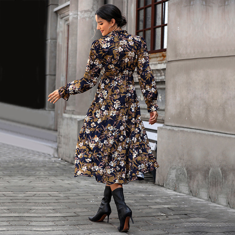 Women's Flowing Floral Midi Dress with V-Neck, Smocked Waistband, and Tiered Skirt Chichicherry