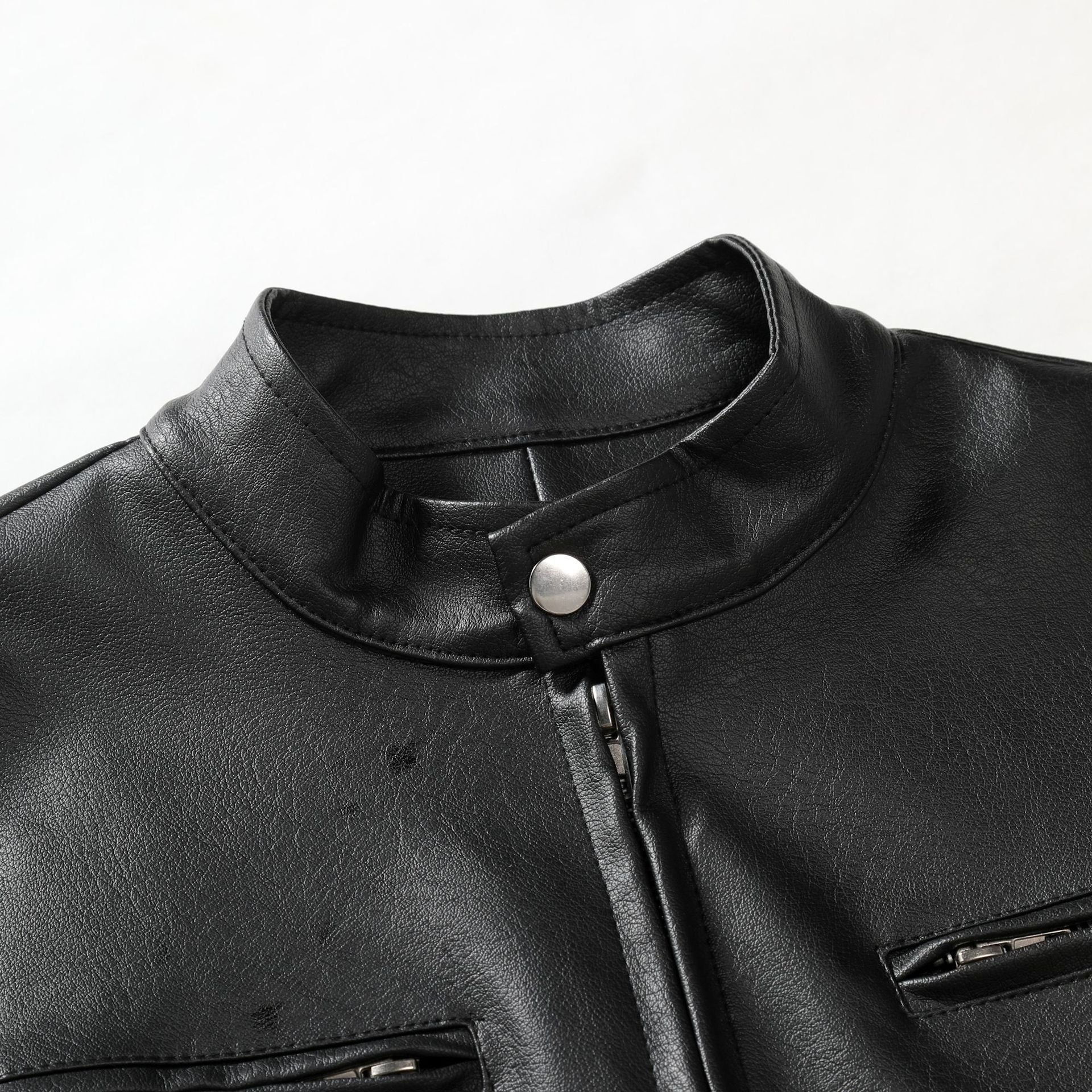Men's Slim Leather Jacket in Urban Biker Style with Stand Collar and Chest Zipper Pockets Chichicherry