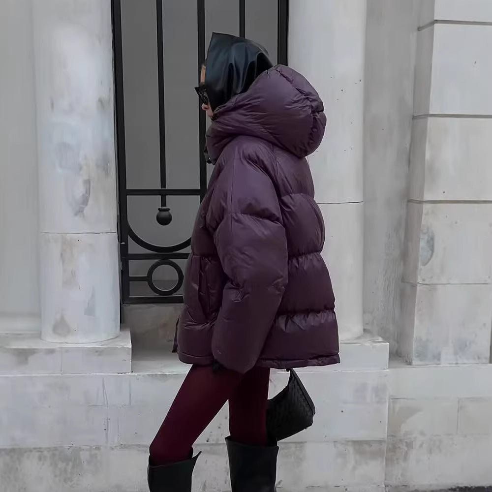 Ladies short padded oversized quilted jacket with high standing collar and hood Chichicherry