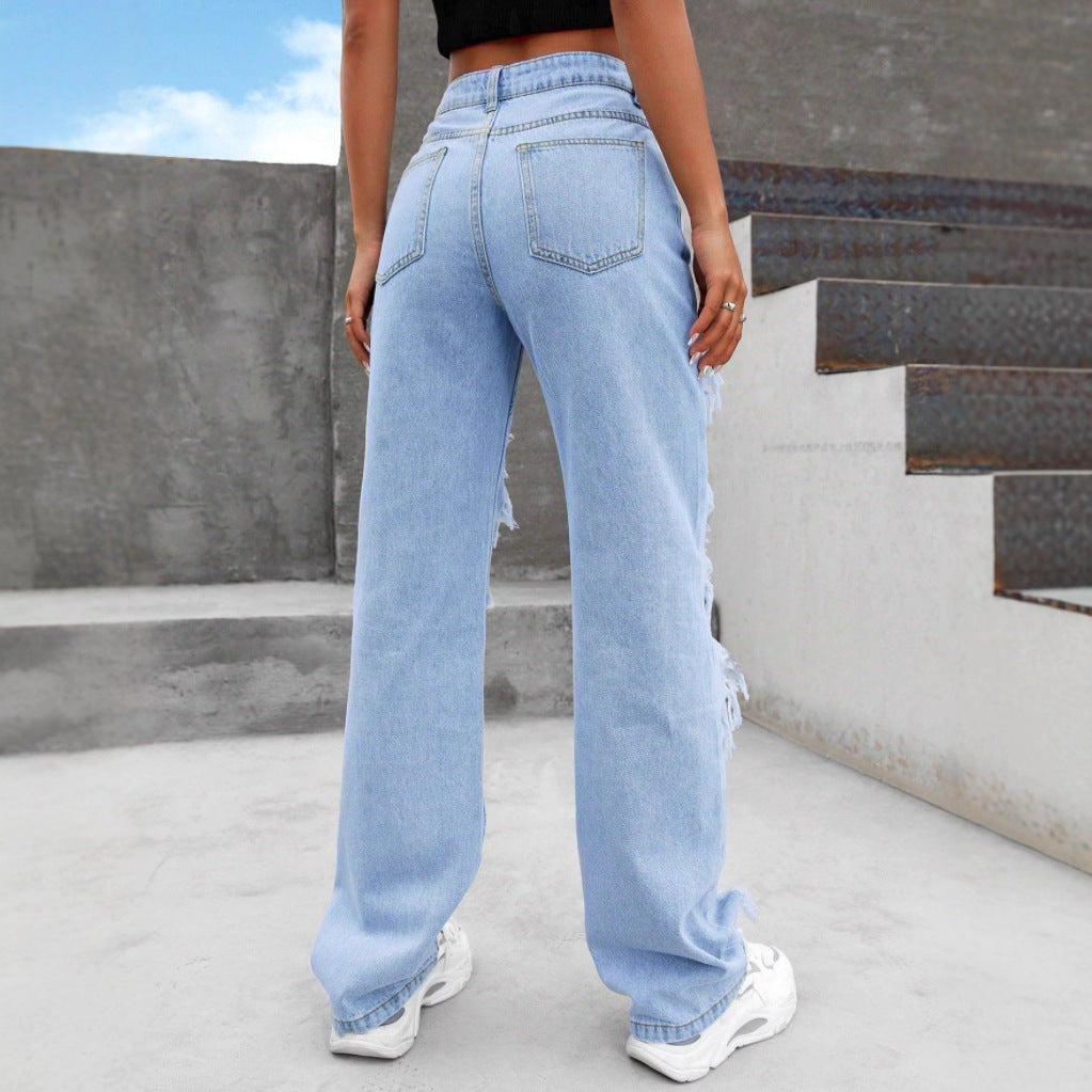 Women high-cut heavily ripped denim jeans with wide leg and decorative seam panels Chichicherry