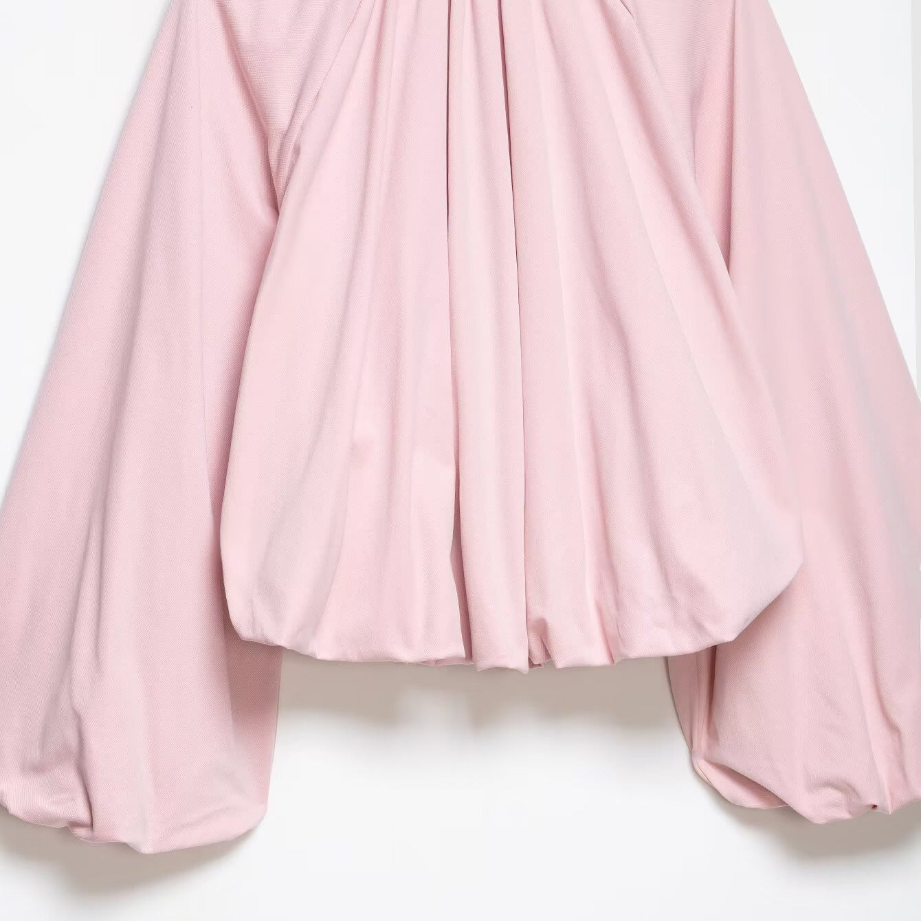 Women's short cut blouson jacket with wide balloon sleeves, zipper, and elastic hem Chichicherry