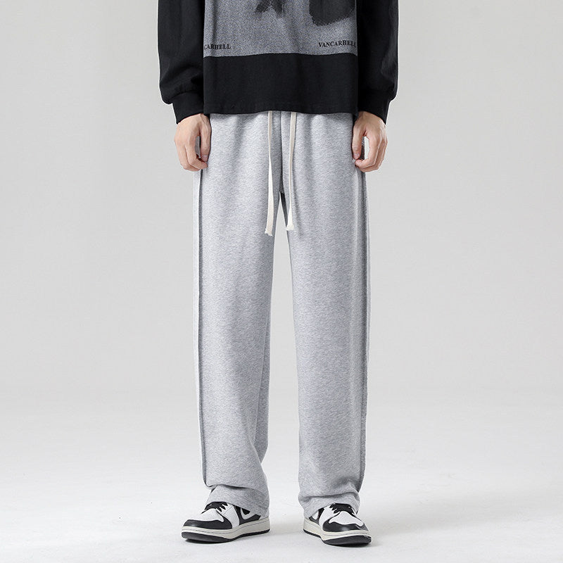 Men's wide jogging pants in oversized fit with side stripes, drawstring & fleece lining Chichicherry