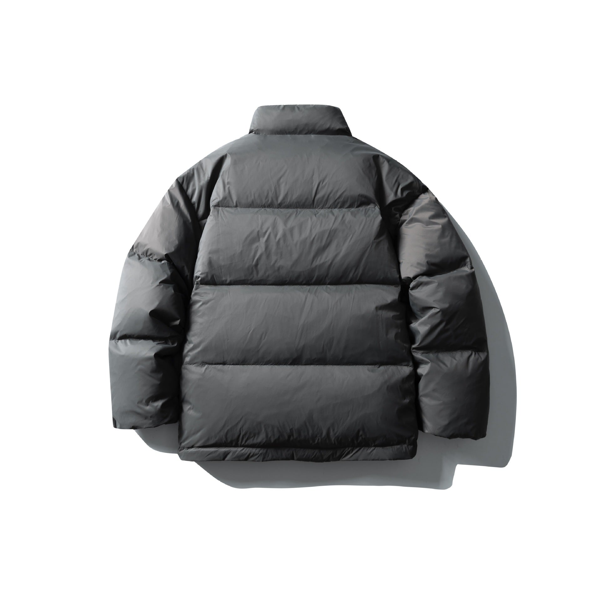 Unisex Boxy-padded short jacket with high stand-up collar and water-repellent shell Chichicherry