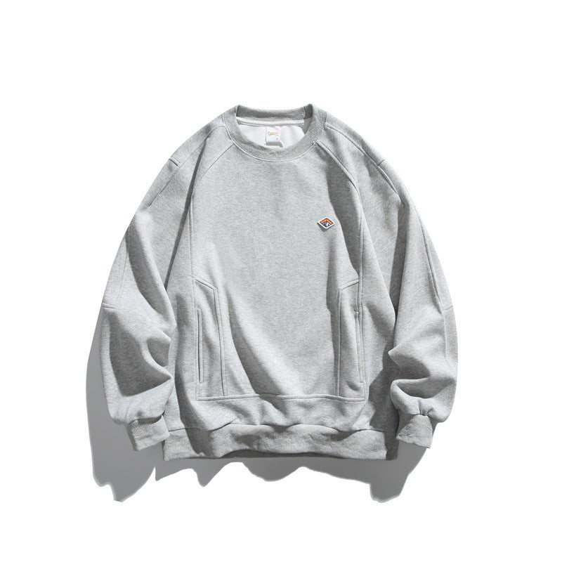 Unisex Oversize sweatshirt made of French terry with raglan sleeves, concealed side pockets, and a small logo patch Chichicherry