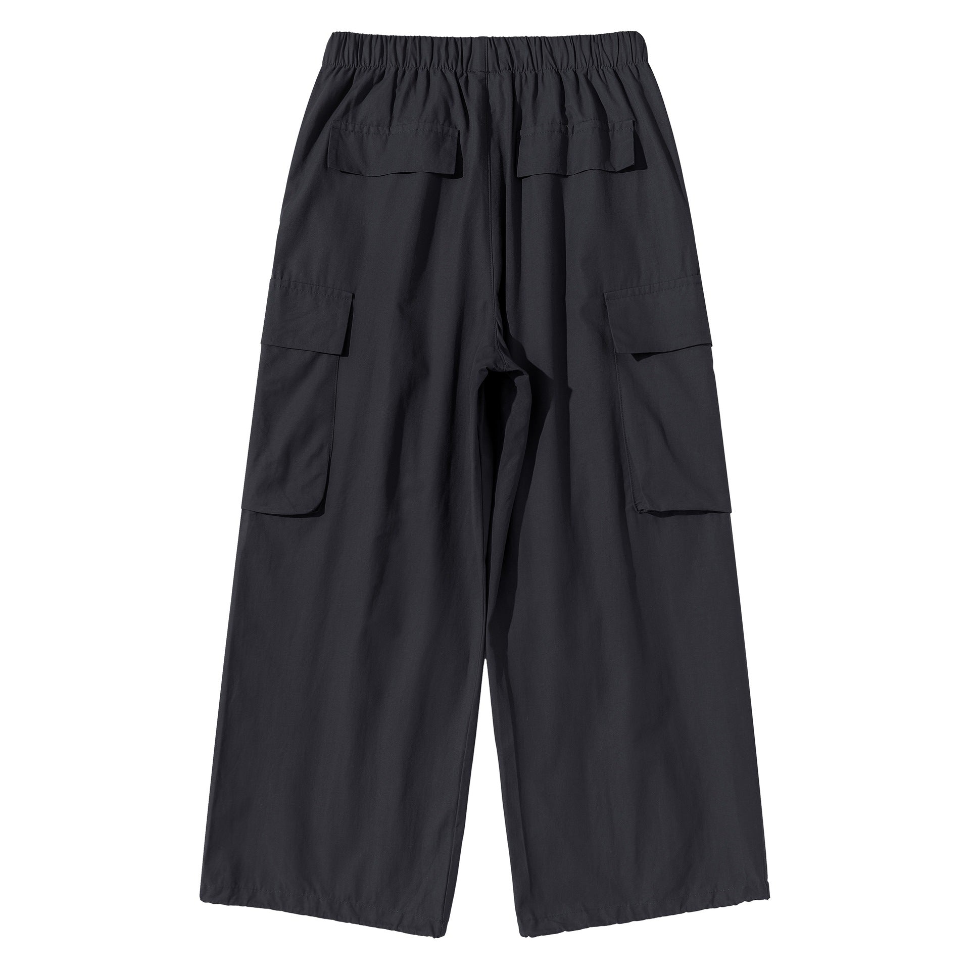 Women's culotte cargo bermudas in utility look with elastic tunnel drawstring waistband and large flap pockets.
