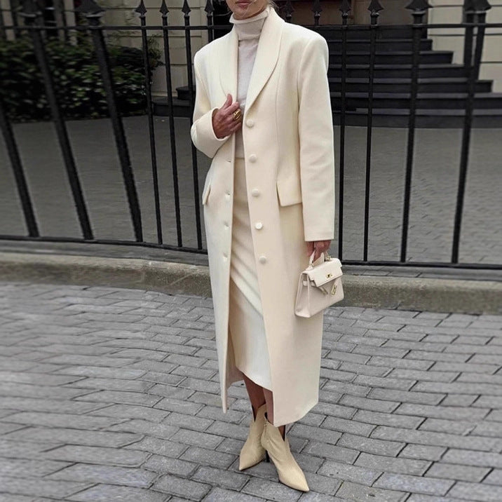 Women's tailored long coat with shawl collar and peplum waist Chichicherry