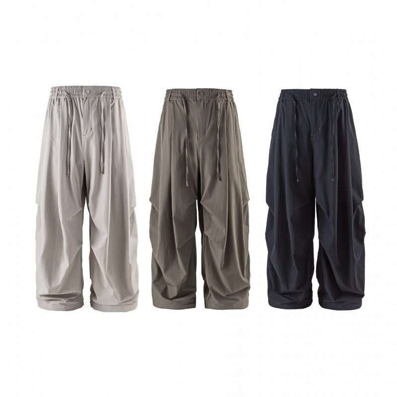Unisex Loose-fitting technical cargo pants with elastic waistband, drawstring, and zip pockets Chichicherry