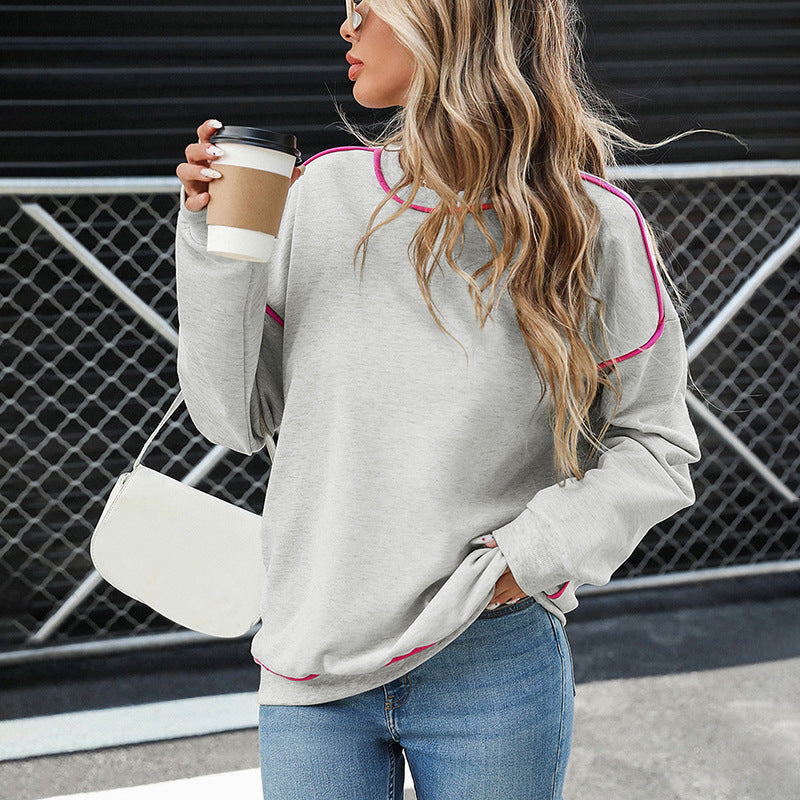 Women's oversized sweatshirt with contrast piping, dropped shoulder, and rounded hem Chichicherry