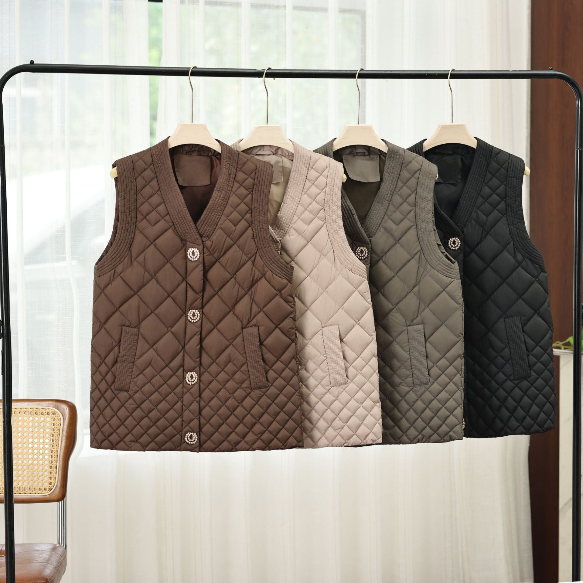 Ladies nano quilted vest with decorative buttons and V-neck Chichicherry