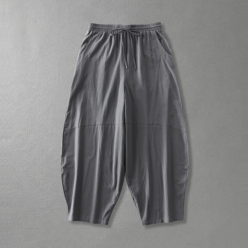 Women's wide harem pants made of lightweight satin with drawstring and side pockets Chichicherry